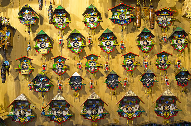 The wall at the gift shop full of the clocks made in the national style. Mayrhofen, Tyrol, Austria.