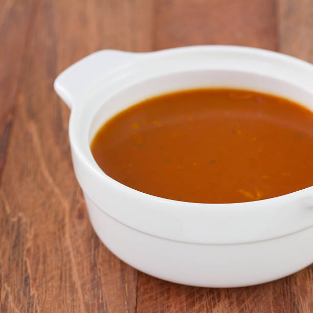 istock tomato soup in white bowl 517484219