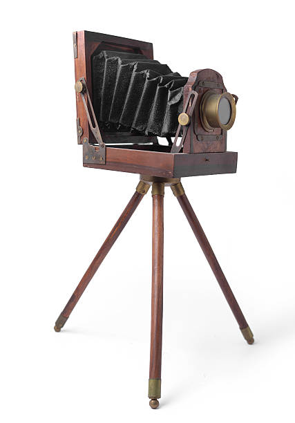 istock Old Wooden Camera isolated on white 517485295