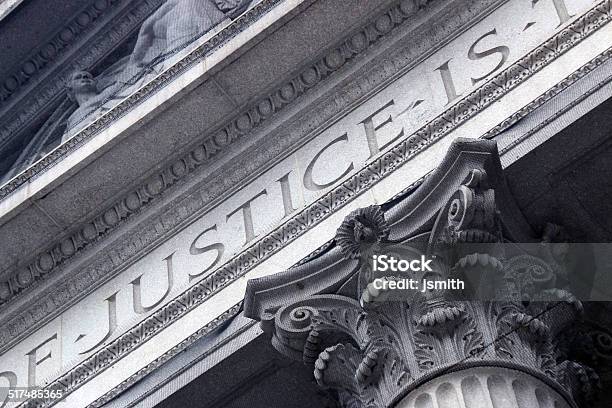 Courthouse Close With Justice Inscribed Stock Photo - Download Image Now - Legal System, Courthouse, Building Exterior