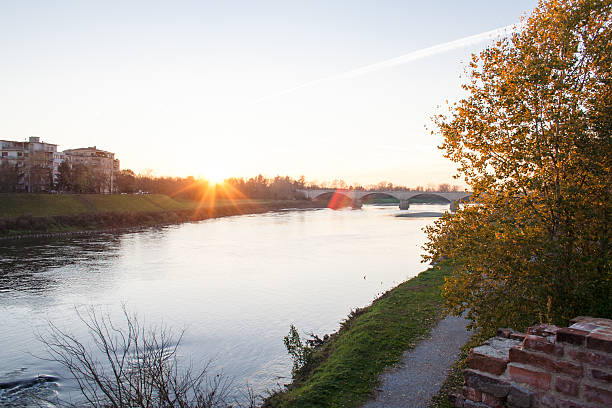 istock Ticino River with houses in Pavia 517487890