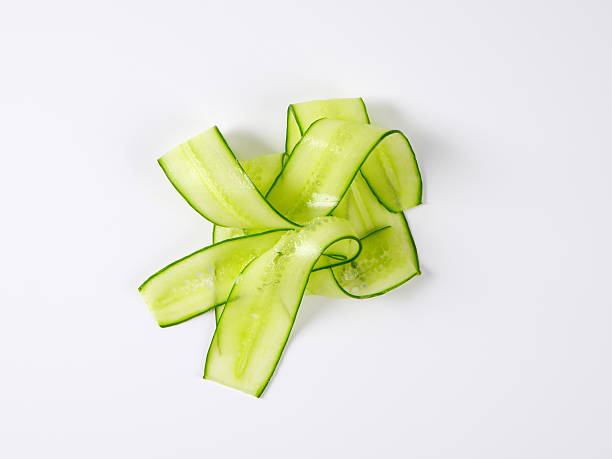 thin cucumber slices thin slices of fresh cucumber cucumber slice stock pictures, royalty-free photos & images