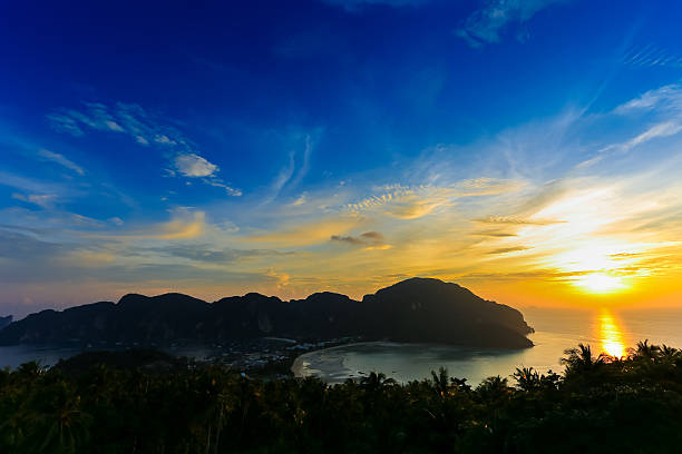 istock Travel vacation background with sunset 517488381