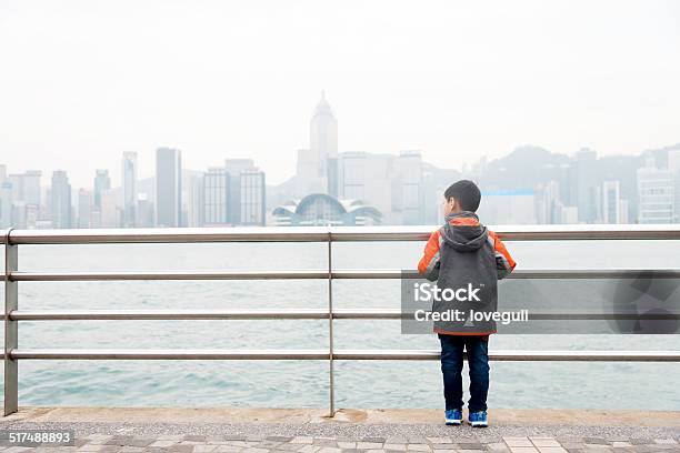 Kd Stand By The Handrail Watching Cityscape Stock Photo - Download Image Now - Asian and Indian Ethnicities, Boys, Child