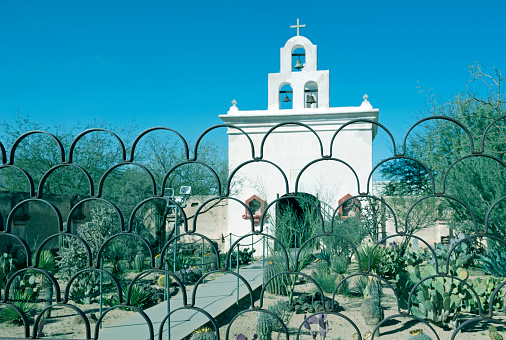 Mortuary chapel with cactus garden at San Xavier del Bac Mission on Tohono O'odham Indian Reservation near Tucson AZ