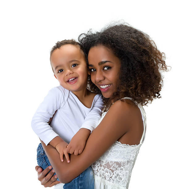 istock African mother holding toddler 517491724