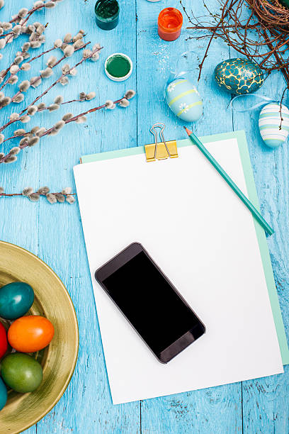 istock The top view of easter on wooden table office workplace 517491746