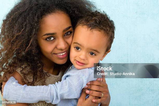 African Toddler Hugging Mom Stock Photo - Download Image Now - Ethiopian Ethnicity, Family, People