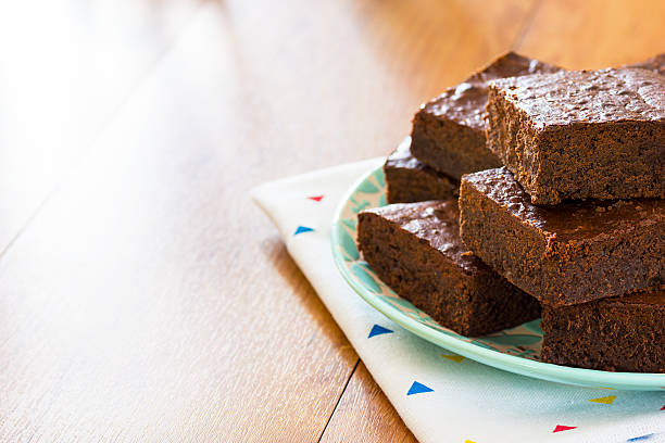 istock Baked Chocolate Brownies Piled on a Plate with Copy Space 517493698
