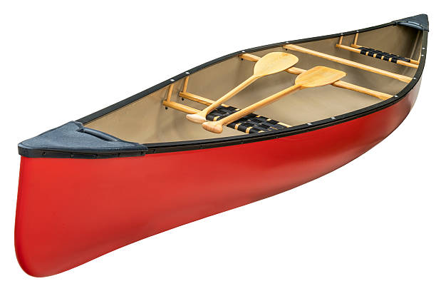 istock red canoe with wooden paddles 517495170