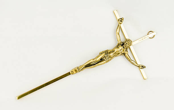 istock Jesus on metal cross 517498392