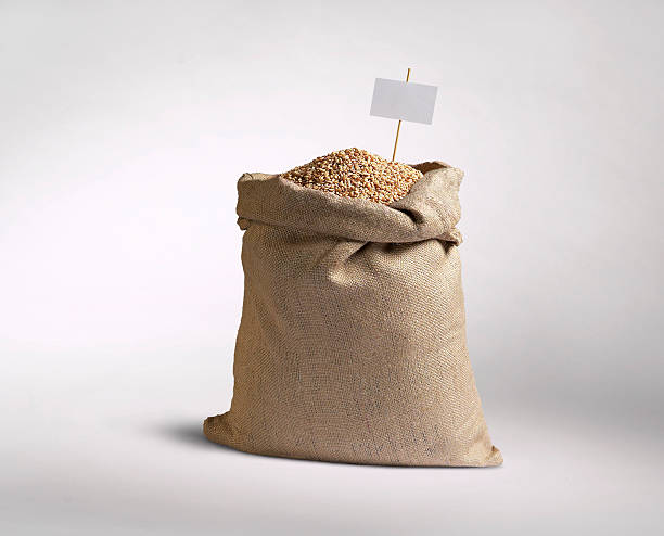 sack of grain Bags of cereal with cartel price sack stock pictures, royalty-free photos & images