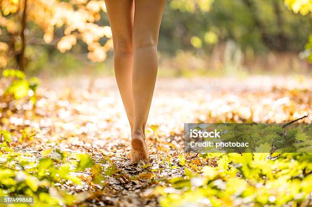 Cropped View Of Beautiful Young Woman Walking Stock Photo - Download Image Now - Naked, Barefoot, Women
