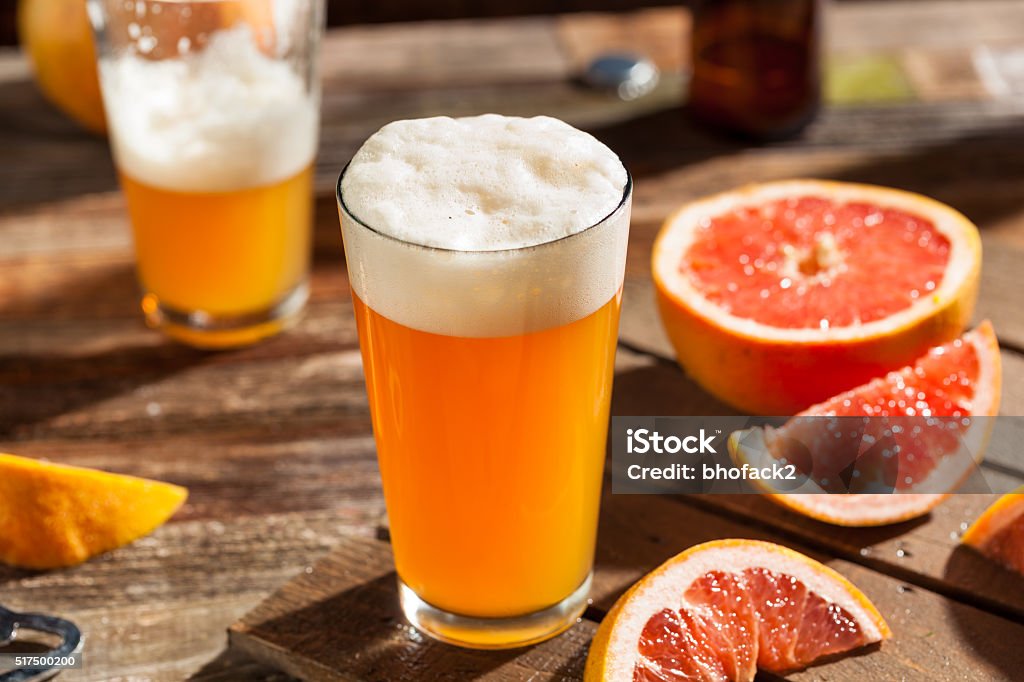 Sour Grapefruit Craft Beer Sour Grapefruit Craft Beer Ready to Drink Beer - Alcohol Stock Photo