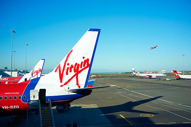 Sydney, Australia - May 16, 2011: A Boeing 737 in the livery of Virgin Blue Airlines sits at Sydney's Kingsford Smith Airport on a sunny day in May 2011.