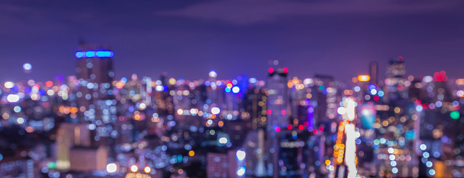 Blurred Photo bokeh of Cityscape view at twilight time, Thailand