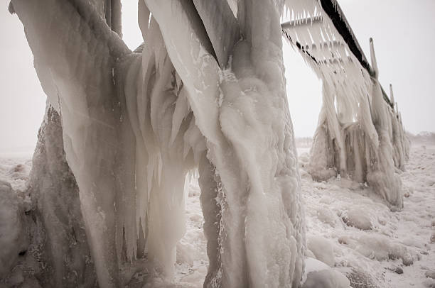 istock Thick ice covering a pier on Lake MIchigan. 517501990
