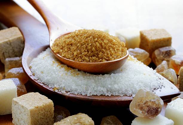 istock different types of sugar - brown, white and refined sugar 517502747
