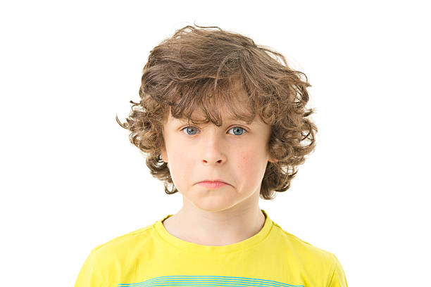 picture of curly 8 years old boy isolated on white