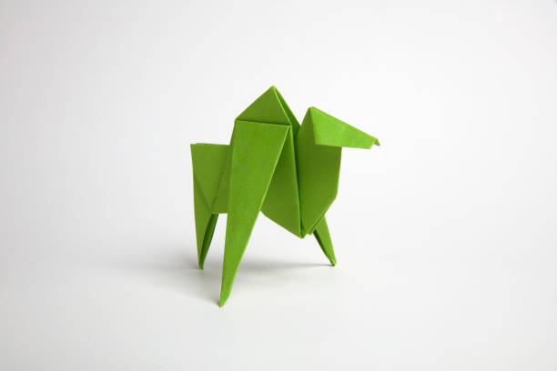 Origami green camel recycle paper