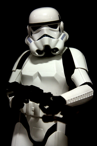 Vancouver, Canada - August 17, 2015: An Imperial Stormtrooper action figure from the Star Wars film franchise posed on black. 