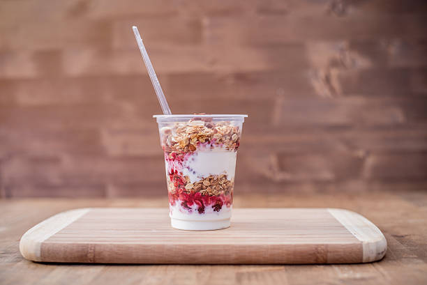 Breakfast granola with yogurt and strawberries Breakfast granola with yogurt and strawberries parfait stock pictures, royalty-free photos & images