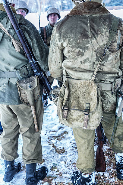 istock WWII US Army Winter Soldiers Talking After Winter Training Exercise 517515556