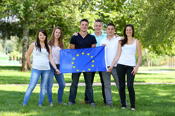 Group of teenagers and Flag stock photo