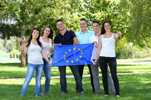 Group of teenagers and Flag stock photo