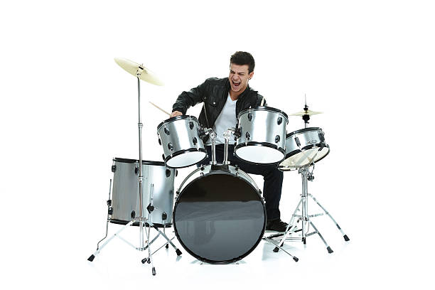 istock Casual man playing drums 517517386