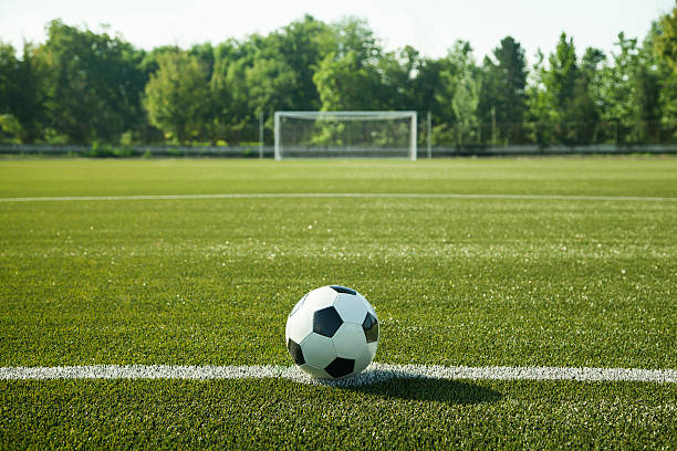 istock Soccer ball and goal 517518255