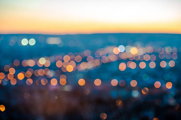 istock city blurring lights abstract circular bokeh on blue background 517518377