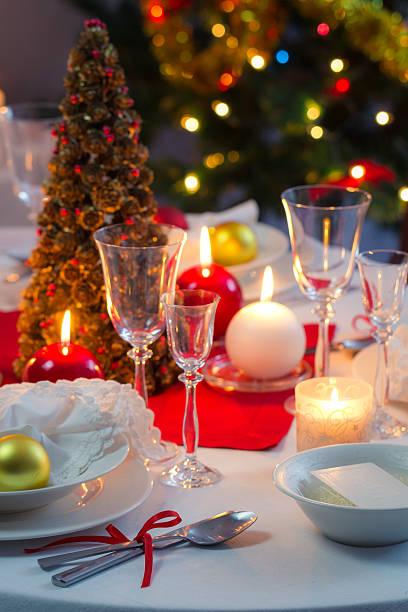 istock Candlelight on a table decorated beautifully for Christmas 517519053