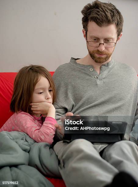 Family Using Tablet Together Stock Photo - Download Image Now - Arts Culture and Entertainment, Canadian Culture, Child