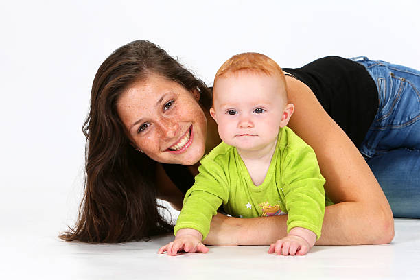 Baby and Babysitter stock photo
