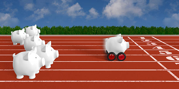 white piggy bank with wheels winning the race