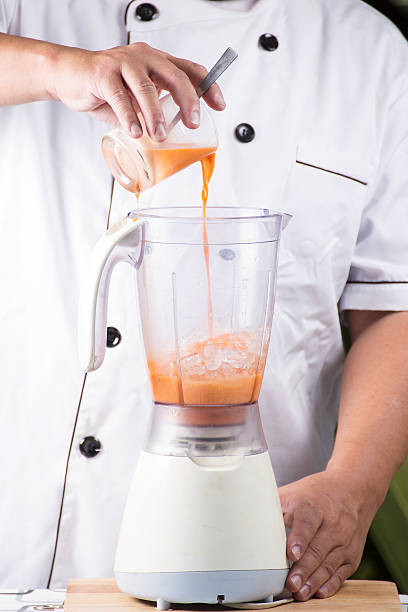 istock Pouring Thai Tea to Blender 517520510