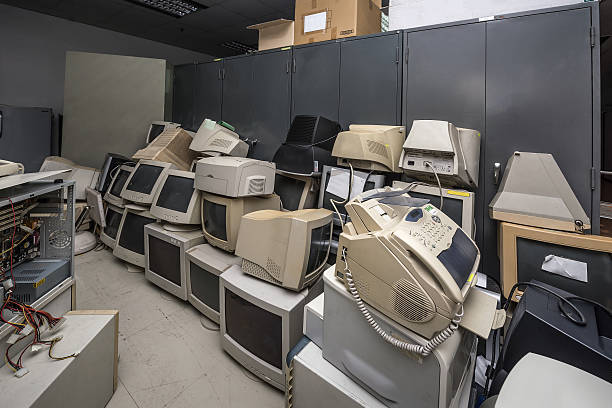 Old monitors and computer parts Old monitors and computer parts in office obsolescence stock pictures, royalty-free photos & images