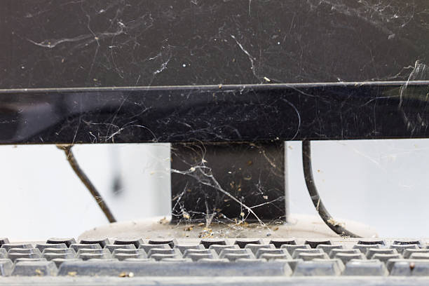 istock keyboard with full of dust and cobweb 517522076