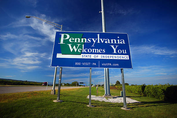 Welcome to Pennsylvania sign Welcome to Pennsylvania sign at the Pennsylvania/New York state line along Interstate 90. pennsylvania stock pictures, royalty-free photos & images