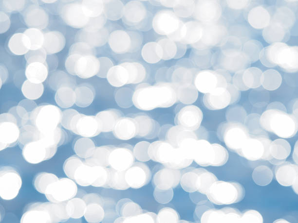 istock Blue bokeh abstract light background. Blurred Lights on blue background. 517524618
