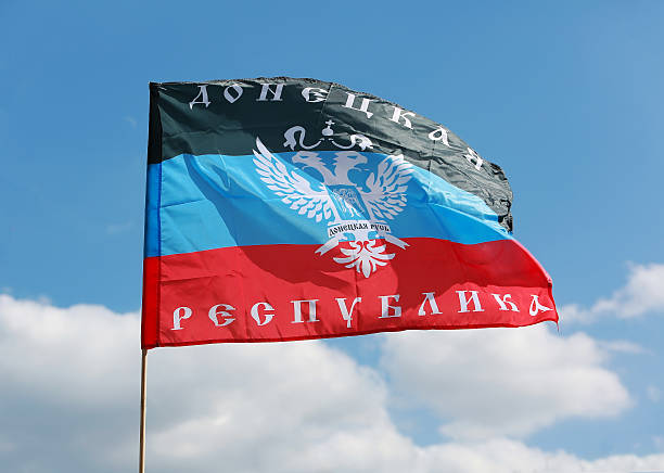 Donetsk Republic Flag Donetsk Republic Flag on background the sky donets basin photos stock pictures, royalty-free photos & images