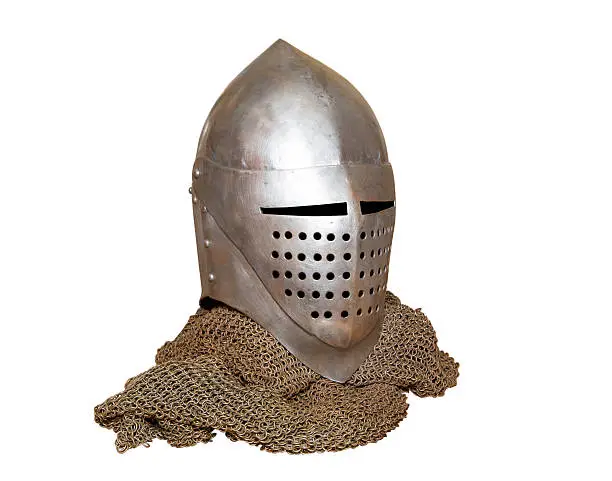 old knight helmet and chain mail for protection in battle. is made of metal. of knightly armor