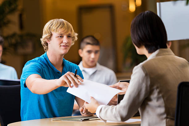 istock College student interviews at job fair 517533336