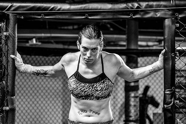 istock Female Cage MMA Fighter 517534567