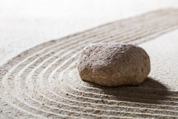 istock stone on sinuous waves for concept of serenity or beauty 517534580