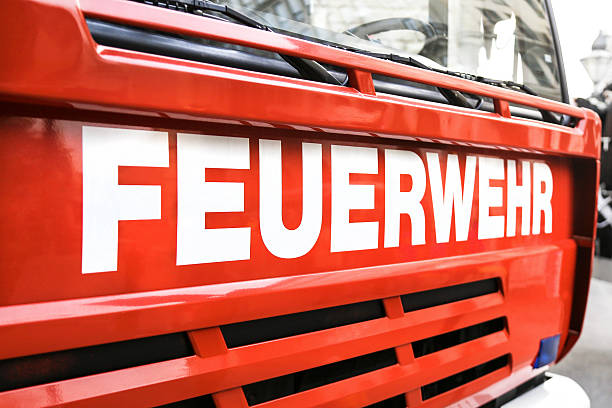 Feuerwehr (German fire department) sign on a red truck.