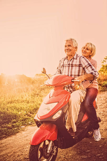istock Senior couple on a scooter 517535307