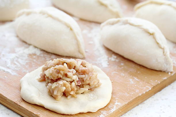 istock Preparing food. Dough and mince. 517535378