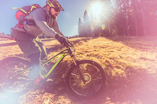 istock Close up of a mountain biker on a dirt road 517536240